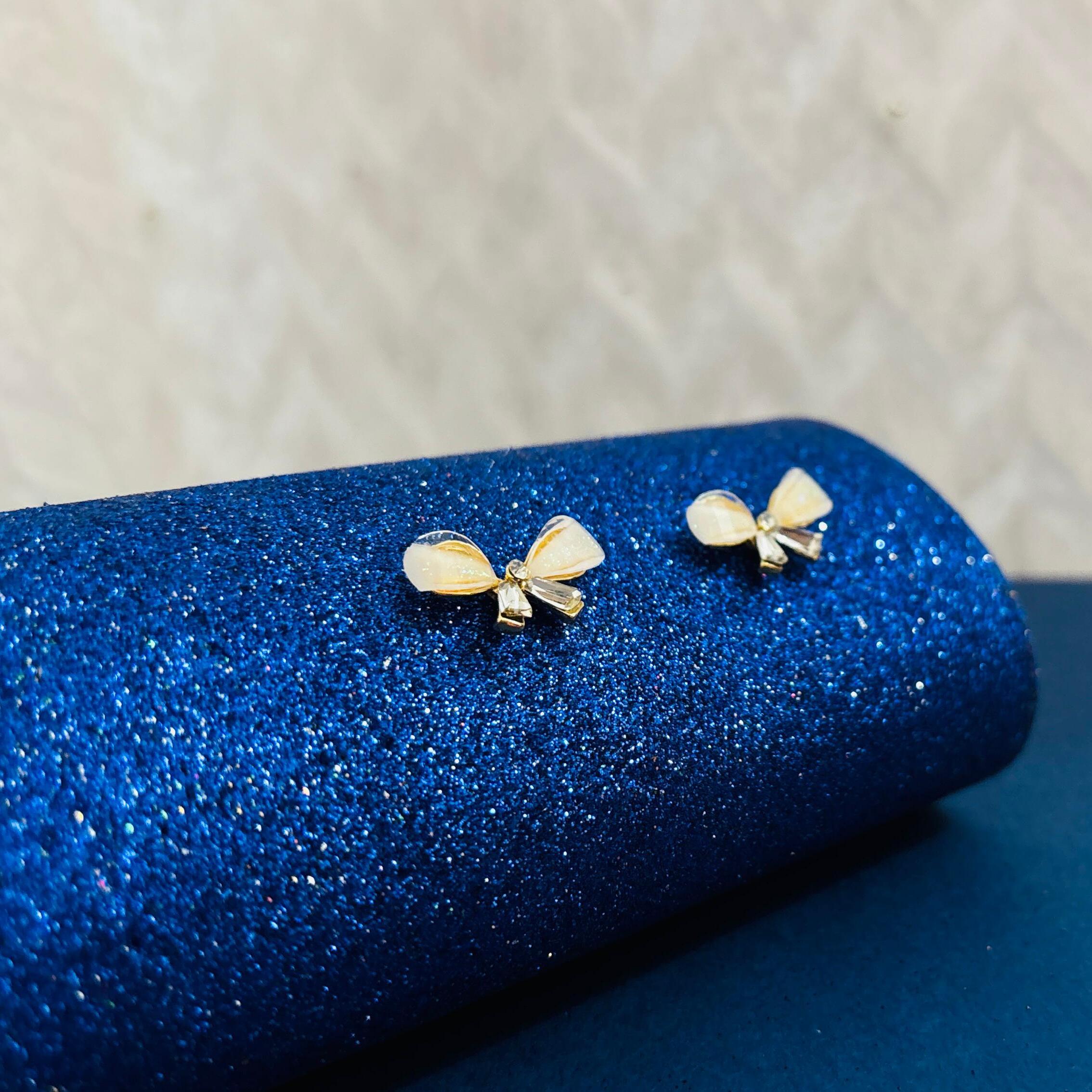 Pearl Whisper: Petite Bow Earrings